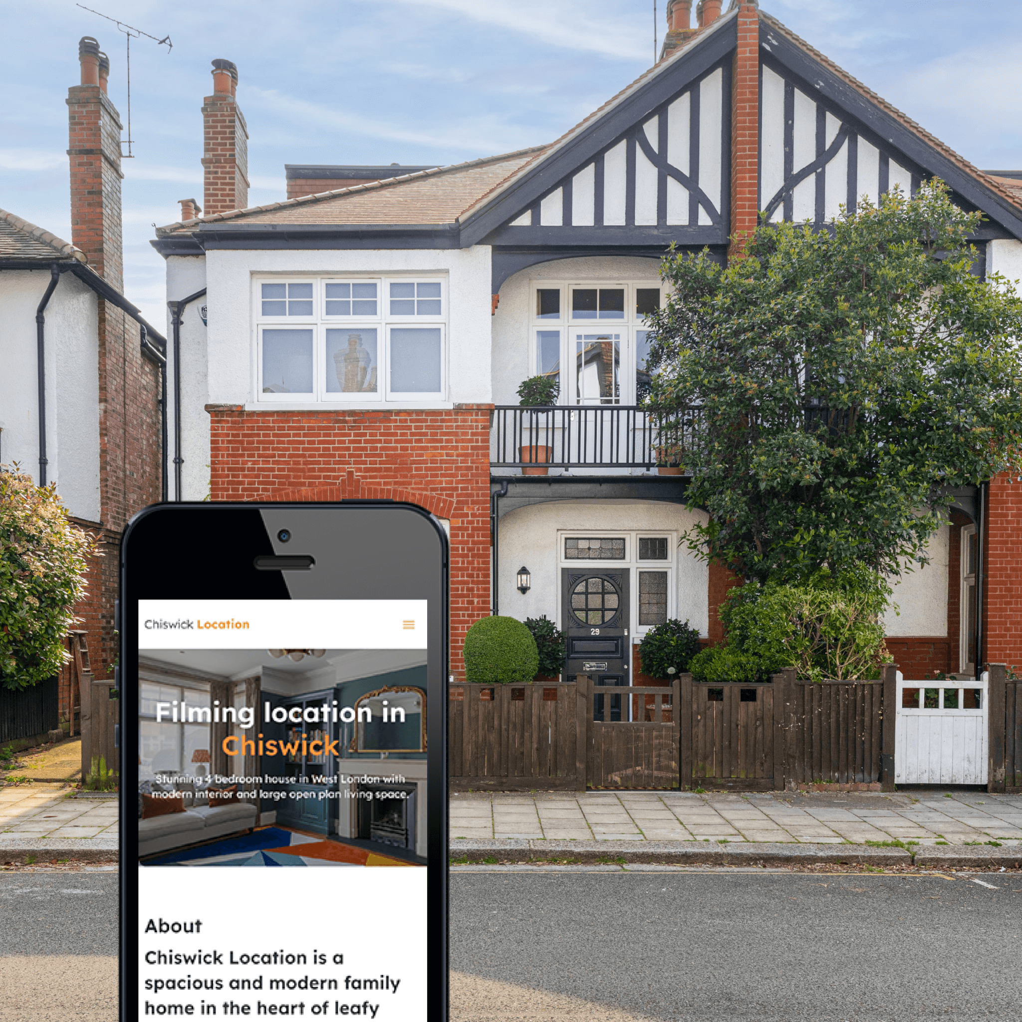 New website Chiswick Location website on an iPhone, in front of the house