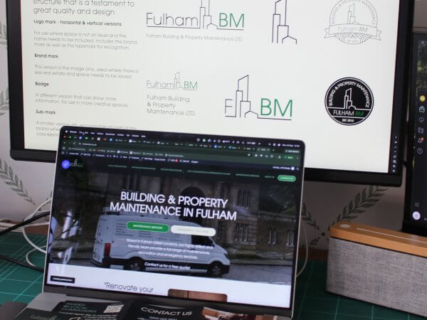 Fulham BM brand shown across devices — the logo suite on a desktop screen and the building and property maintenance homepage on a laptop